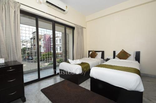 Service Apartment in Salt Lake City, Kolkata | Master Bedroom