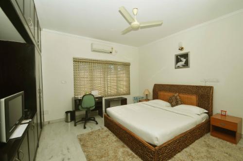 Service apartments in Bangalore, HBR layout - furnished bedroom
