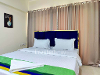 Bedroom of TrustedStay Sunshine Service Apartment in Santacruz East, Mumbai
