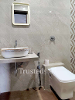 Washroom of TrustedStay Shantikamal Service Apartment in Santacruz East, Mumbai