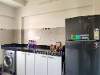Kitchen of TrustedStay Dsilva Niketan Service Apartment in Kurla West, Mumbai
