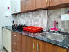 Kitchen of Plot 65 TrustedStay Service Apartment in Gachibowli Hyderabad
