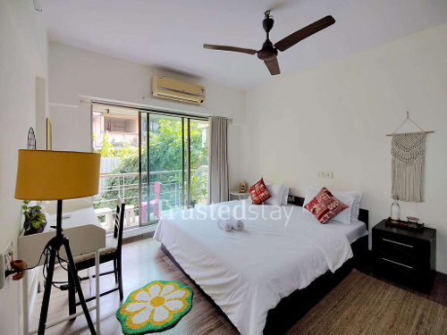 Bedroom one of TrustedStay Raj Galaxy Service Apartment in Santacruz East, Mumbai