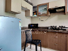 Kitchen of TrustedStay Raj Galaxy Service Apartment in Santacruz East, Mumbai