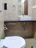 Washroom of TrustedStay Aleta Residences Service Apartment in Powai, Mumbai