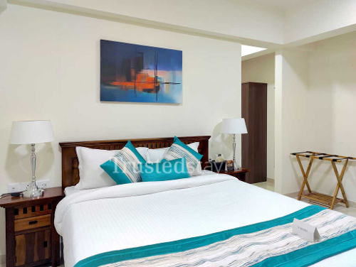 Bedroom one of Mahindra Vicino TrustedStay Service Apartment in Andheri east, Mumbai