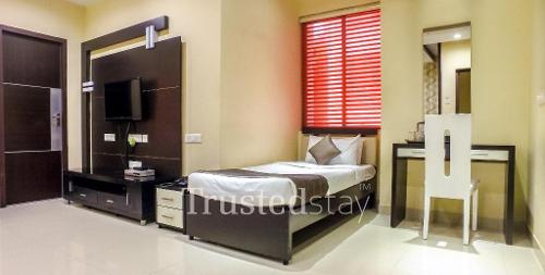 Bedroom one of Plot No 54 TrustedStay Service Apartment in Greams Road, Chennai
